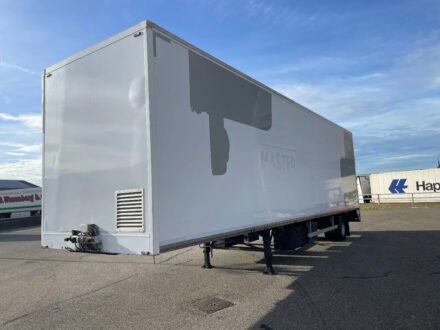 H.T.F. 25G269 2002 1-as gestuurde oplegger met zijdeuren.